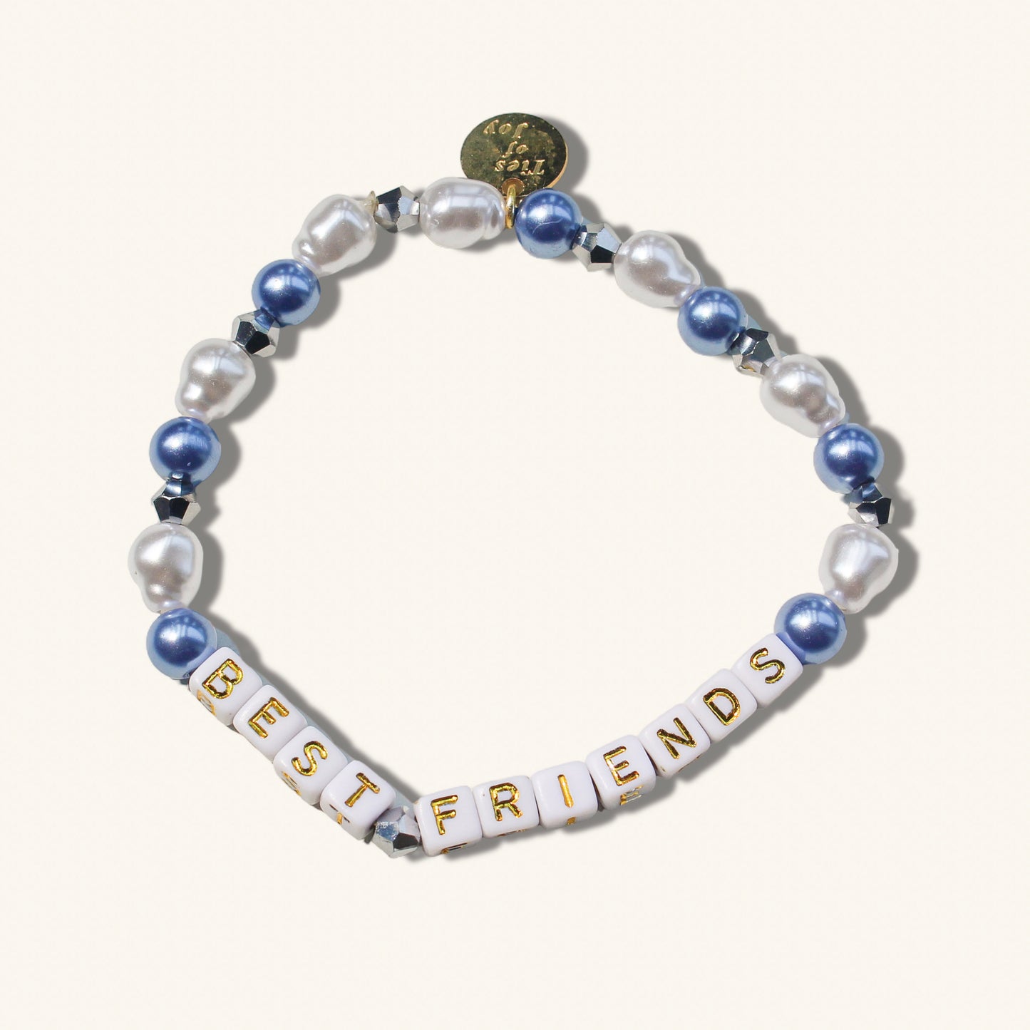 Bracelet with 'BEST FRIENDS' beads on a white background