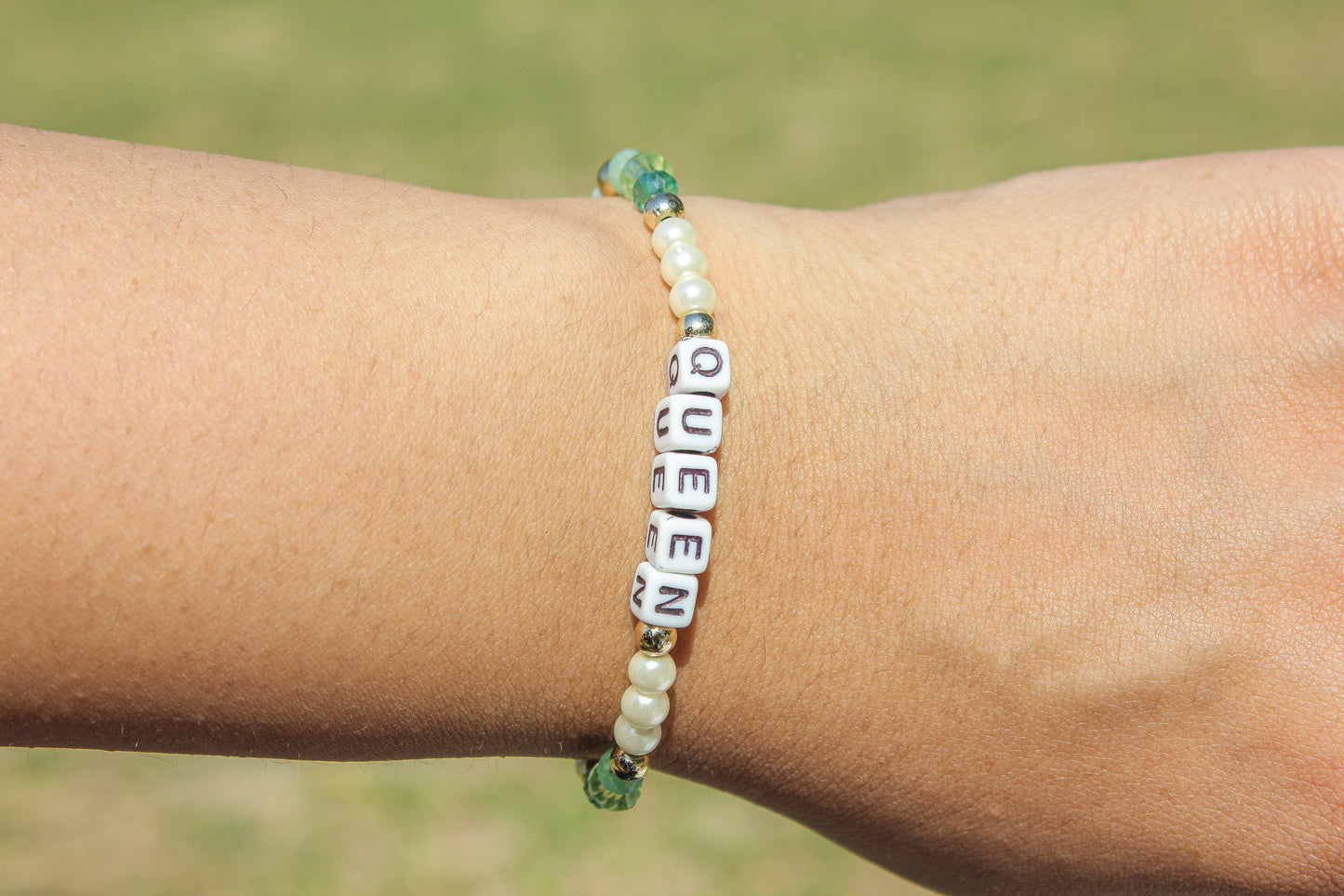 Queen – Custom handmade beaded bracelet with personalized name or mantra. Perfect for gifting, self-expression, and meaningful everyday wear.