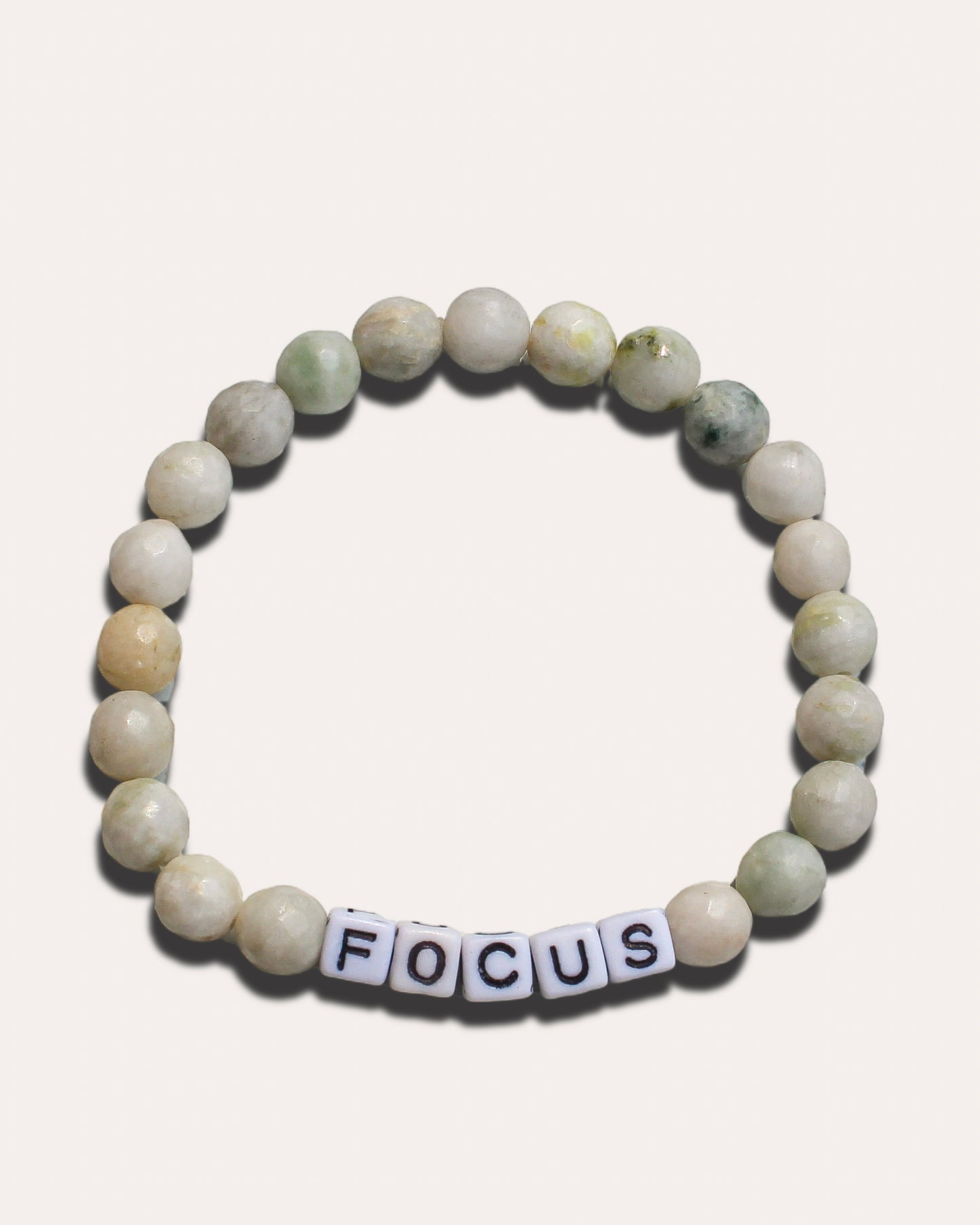 Minimalist focus bracelet for men, handmade with sleek beaded design for clarity and direction.