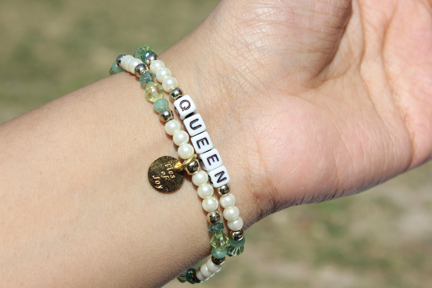 Queen – Custom handmade beaded bracelet with personalized name or mantra. Perfect for gifting, self-expression, and meaningful everyday wear.