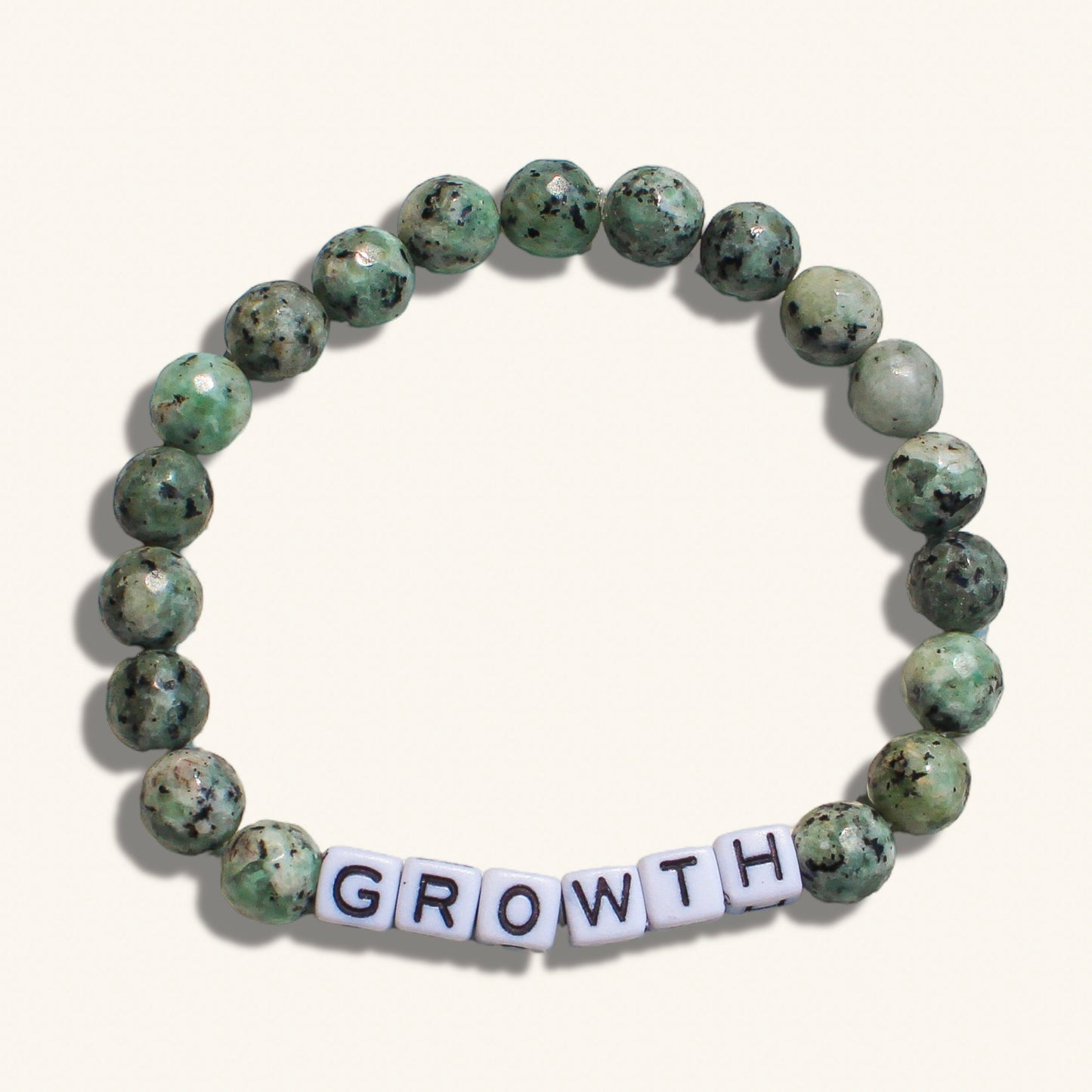 Customizable growth bracelet for men with grounding beads, symbolizing self-development and evolution.