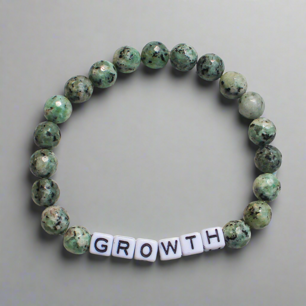 Customizable growth bracelet for men with grounding beads, symbolizing self-development and evolution.