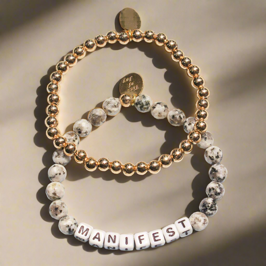 Manifest Stack – Custom handmade beaded bracelet with personalized name or mantra. Perfect for gifting, self-expression, and meaningful everyday wear.