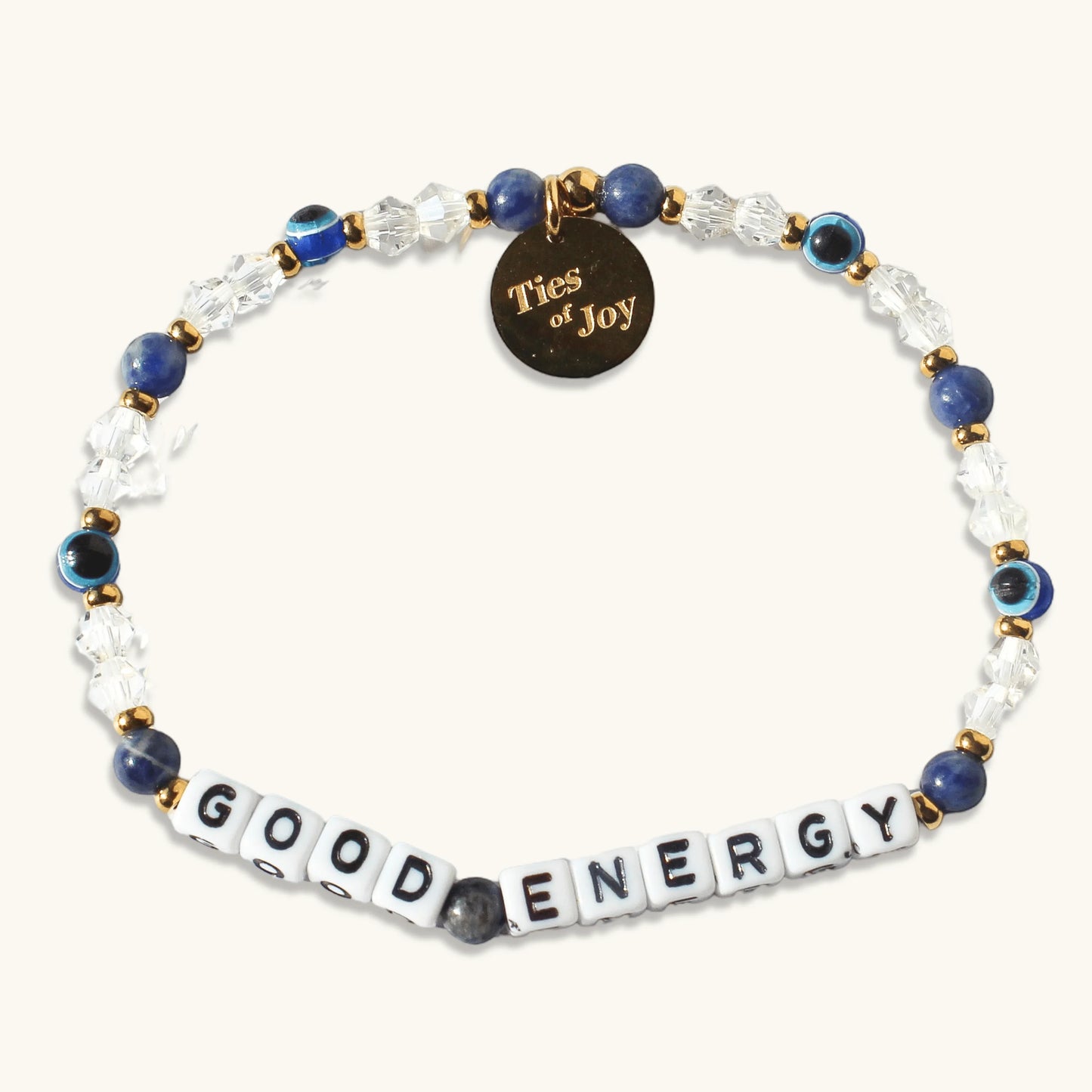 Beaded bracelet with 'GOOD ENERGY' letter beads and Ties of Joy gold charm