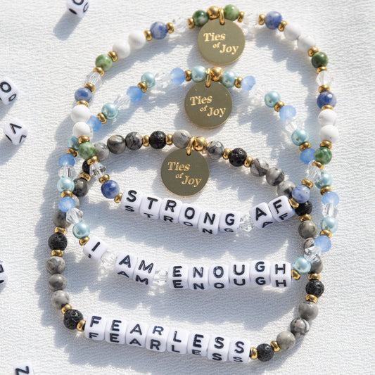 Beaded affirmation bracelets with Ties of Joy charms, phrases strong AF, I am enough, fearless