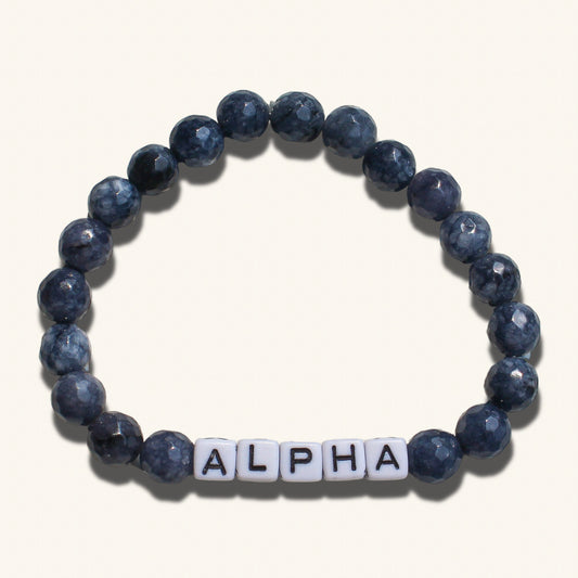 Alpha men’s bracelet with dark beaded design representing bold masculine energy and dominance.
