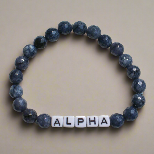 Alpha men’s bracelet with dark beaded design representing bold masculine energy and dominance.