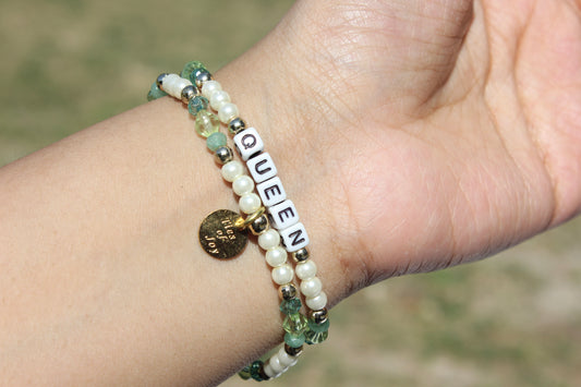 Queen – Custom handmade beaded bracelet with personalized name or mantra. Perfect for gifting, self-expression, and meaningful everyday wear.