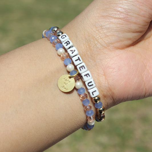 Grateful – Custom handmade beaded bracelet with personalized name or mantra. Perfect for gifting, self-expression, and meaningful everyday wear.