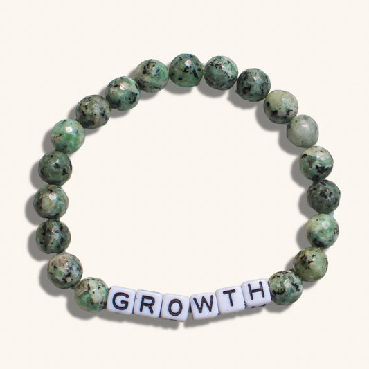 Customizable growth bracelet for men with grounding beads, symbolizing self-development and evolution.