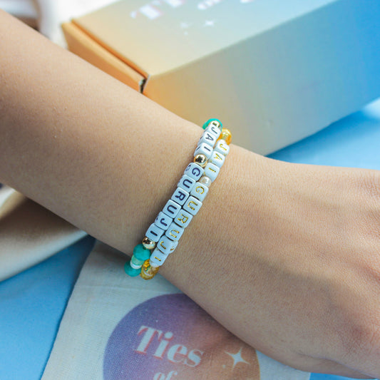 Jai Guru Ji – Custom handmade beaded bracelet with personalized name or mantra. Perfect for gifting, self-expression, and meaningful everyday wear.
