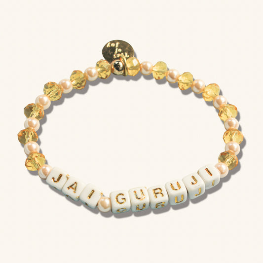 Jai Guru Ji – Custom handmade beaded bracelet with personalized name or mantra. Perfect for gifting, self-expression, and meaningful everyday wear.