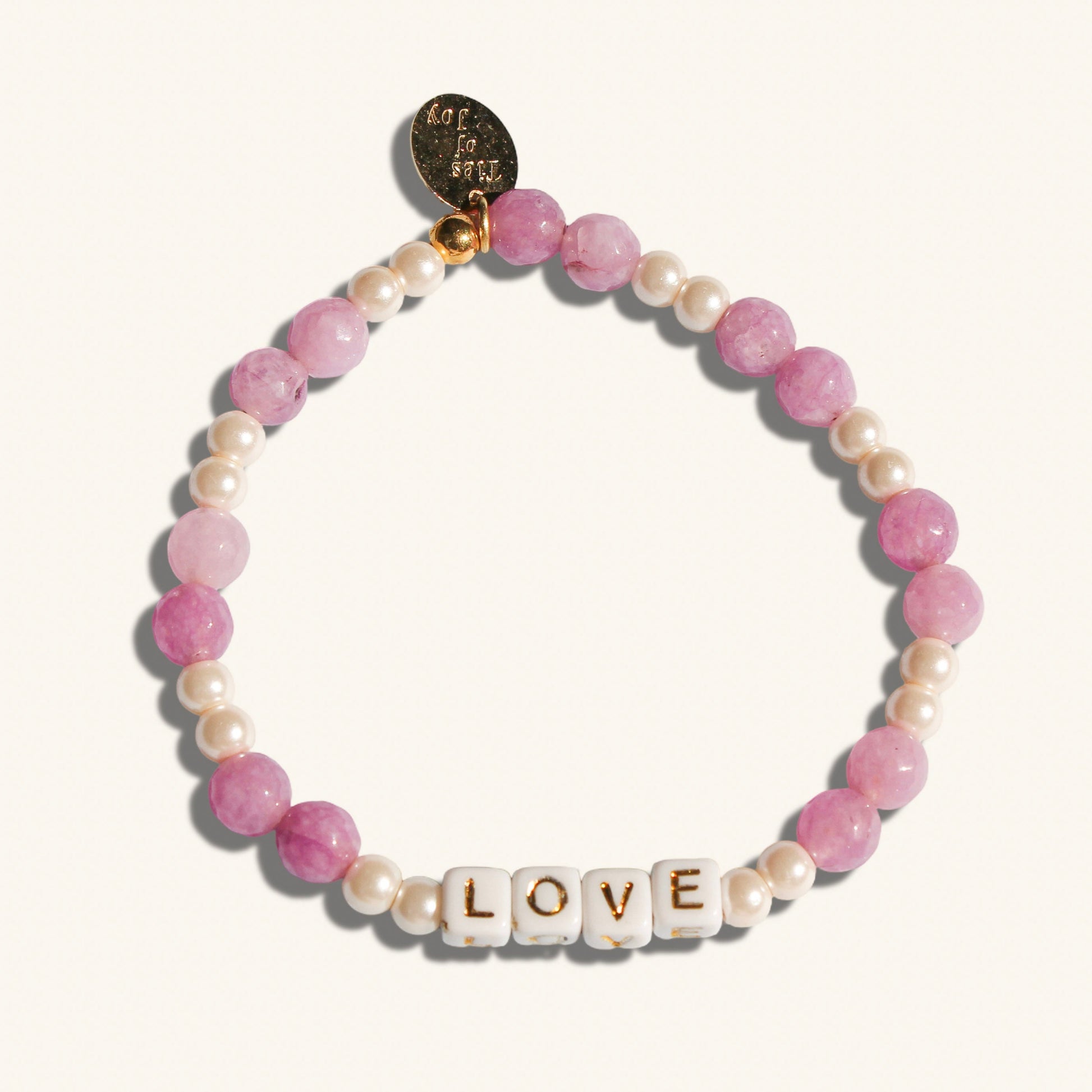 Love—custom handmade beaded bracelet with personalized name or mantra. Perfect for gifting, self-expression, and meaningful everyday wear.