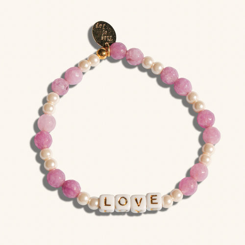 Love—custom handmade beaded bracelet with personalized name or mantra. Perfect for gifting, self-expression, and meaningful everyday wear.