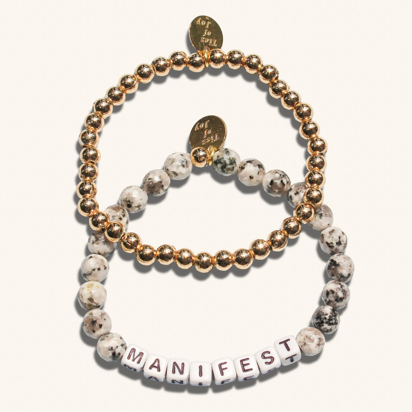 Manifest Stack – Custom handmade beaded bracelet with personalized name or mantra. Perfect for gifting, self-expression, and meaningful everyday wear.