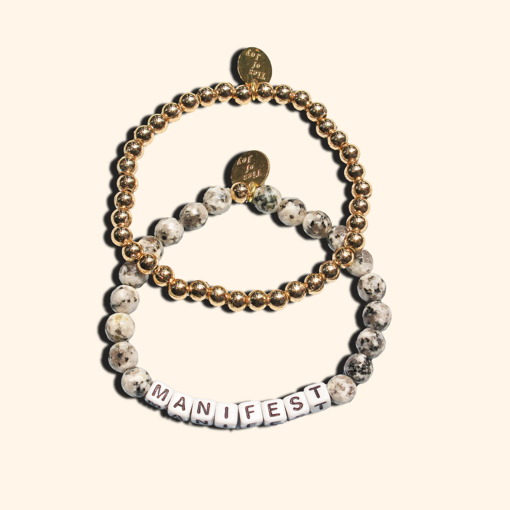 Manifest Stack – Custom handmade beaded bracelet with personalized name or mantra. Perfect for gifting, self-expression, and meaningful everyday wear.