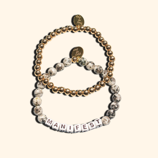 Manifest Stack – Custom handmade beaded bracelet with personalized name or mantra. Perfect for gifting, self-expression, and meaningful everyday wear.