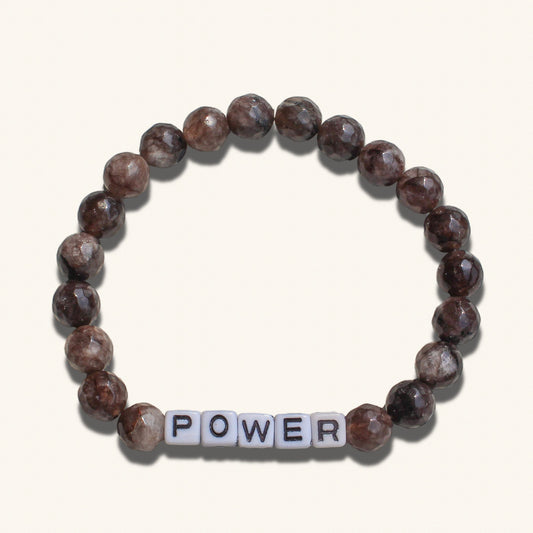 Bold men’s beaded bracelet symbolizing power and confidence, customizable with your word.