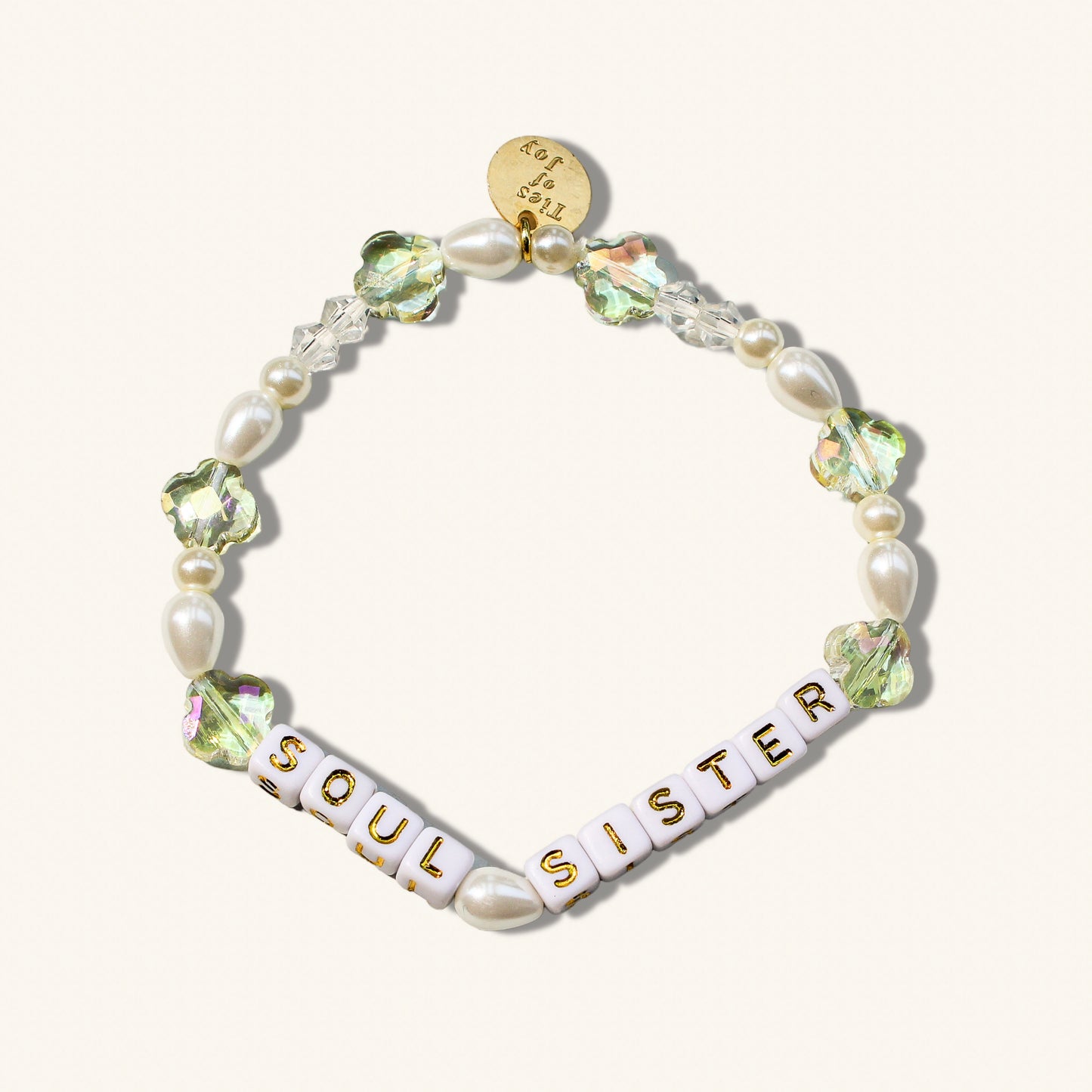 Bracelet with 'Soul Sister' beads on a white background