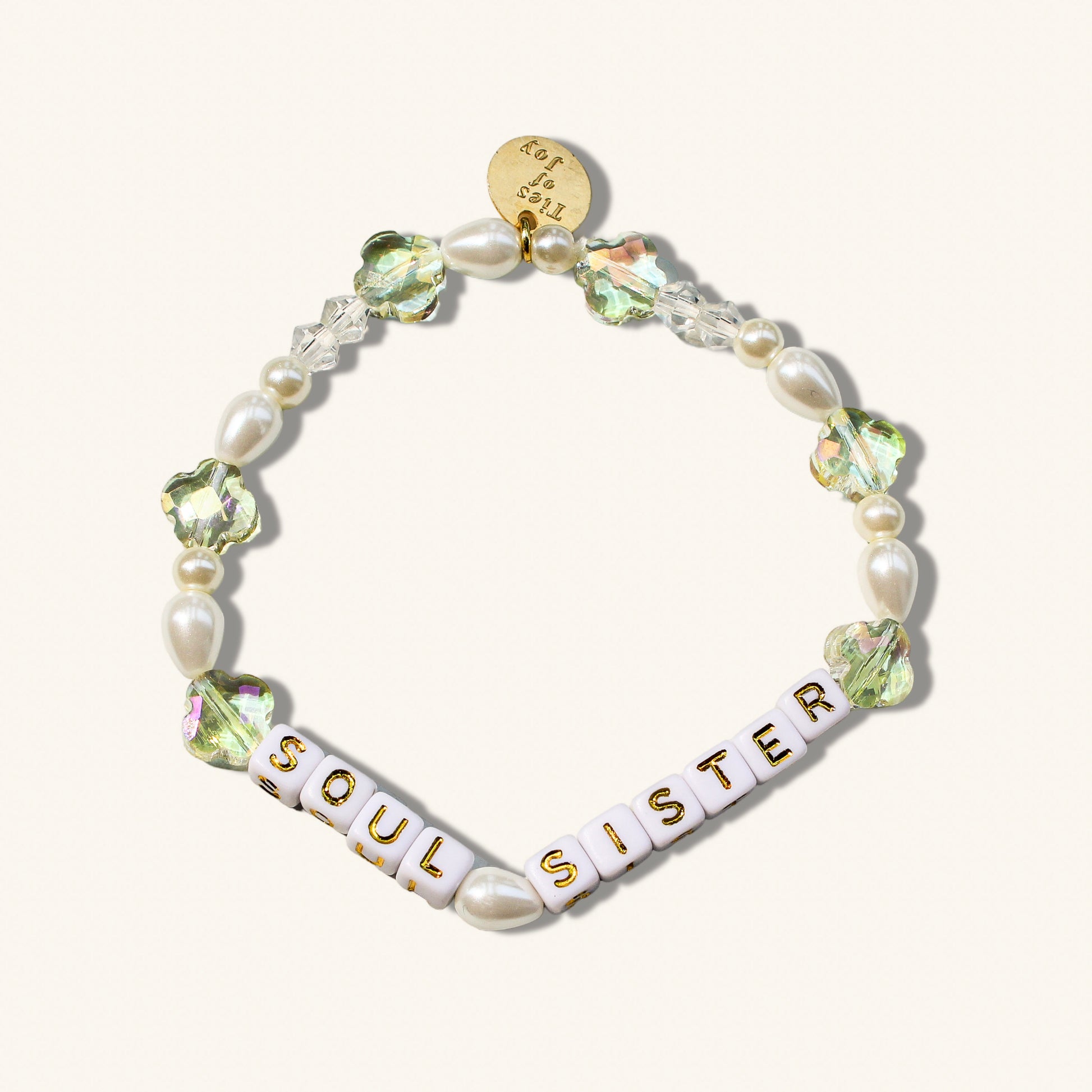 Bracelet with 'Soul Sister' beads on a white background