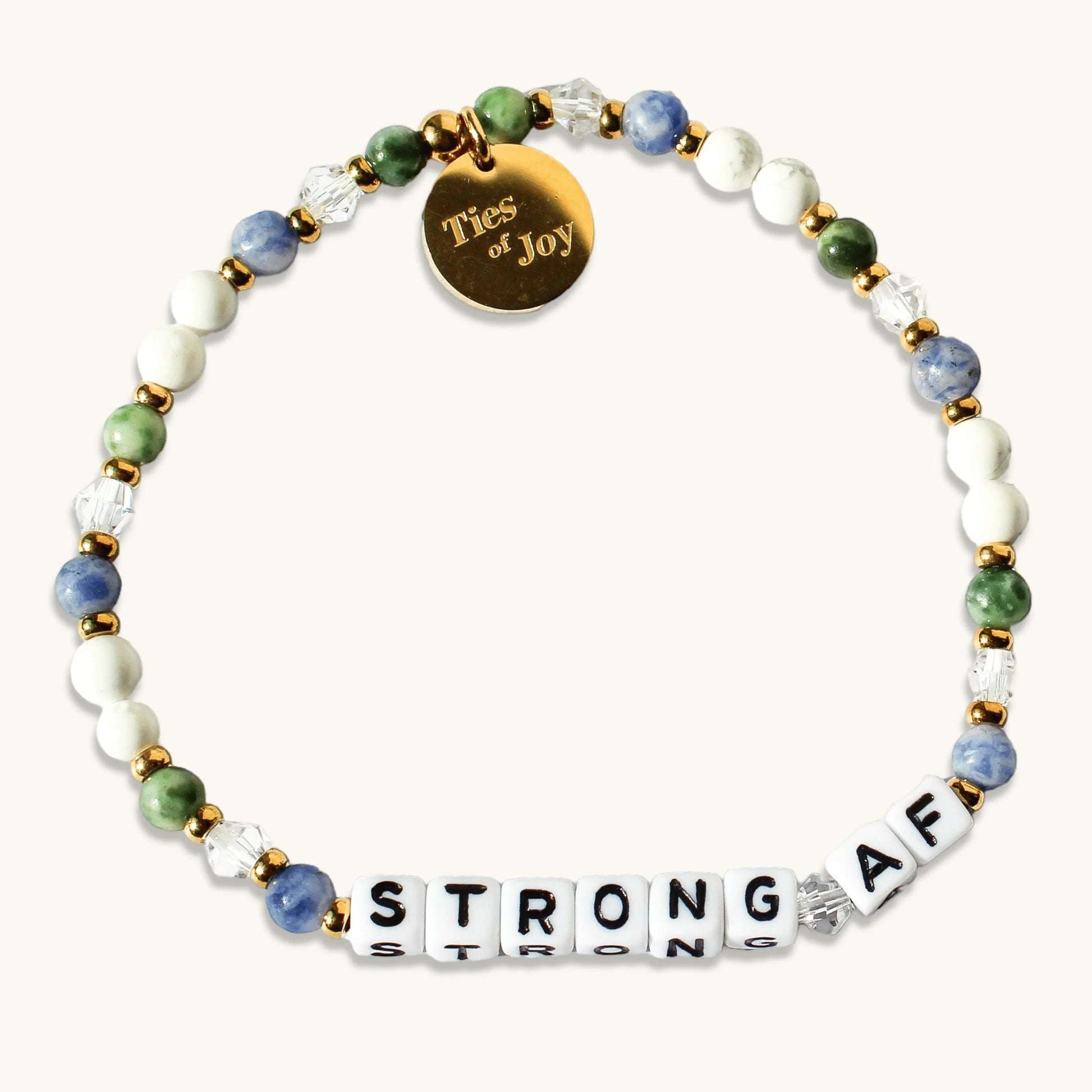 Beaded bracelet with 'STRONG AF' letter beads, gold charm, green, blue, white beads.